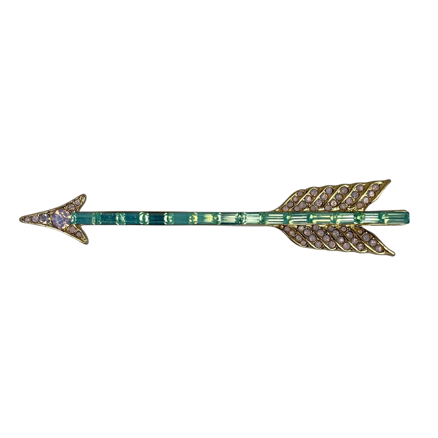 Gold-tone Butler and Wilson arrow brooch featuring mint green baguette crystals and pink rhinestones.