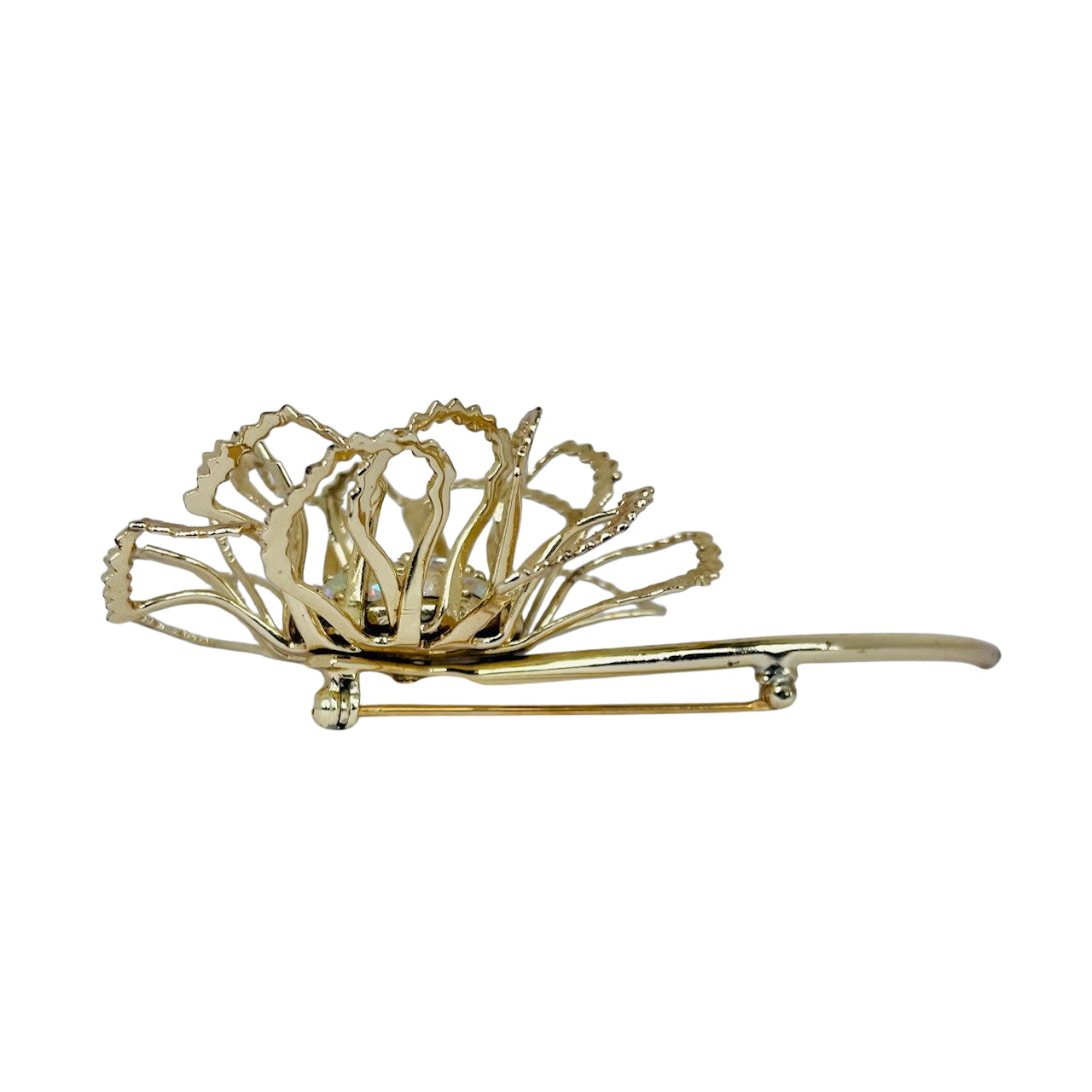 Side view showing the dimensional 3D layered petals and straight pin mechanism of a vintage Sarah Coventry brooch