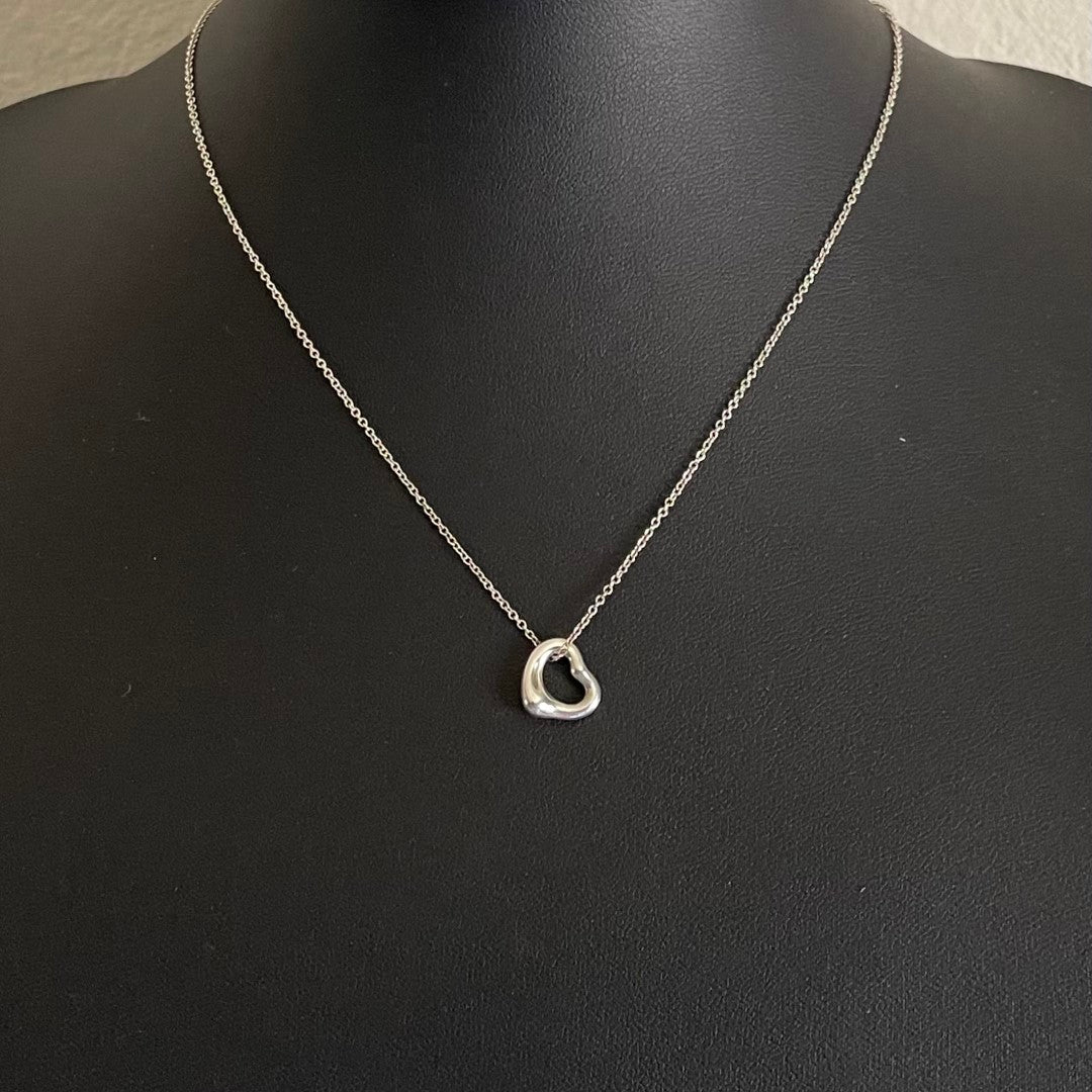 A Vintage Tiffany & Co. Sterling Silver Elsa Peretti Open Heart Pendant Necklace, 11mm