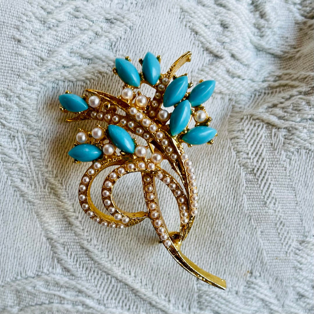 A Vintage Faux Turquoise Brooch signed Exquisite