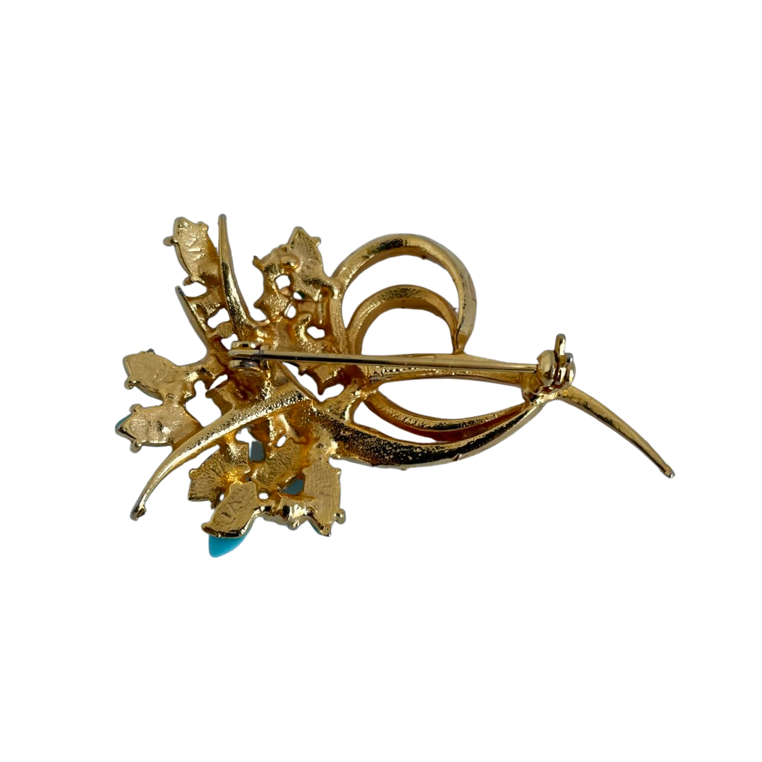 A Vintage Faux Turquoise Brooch signed Exquisite