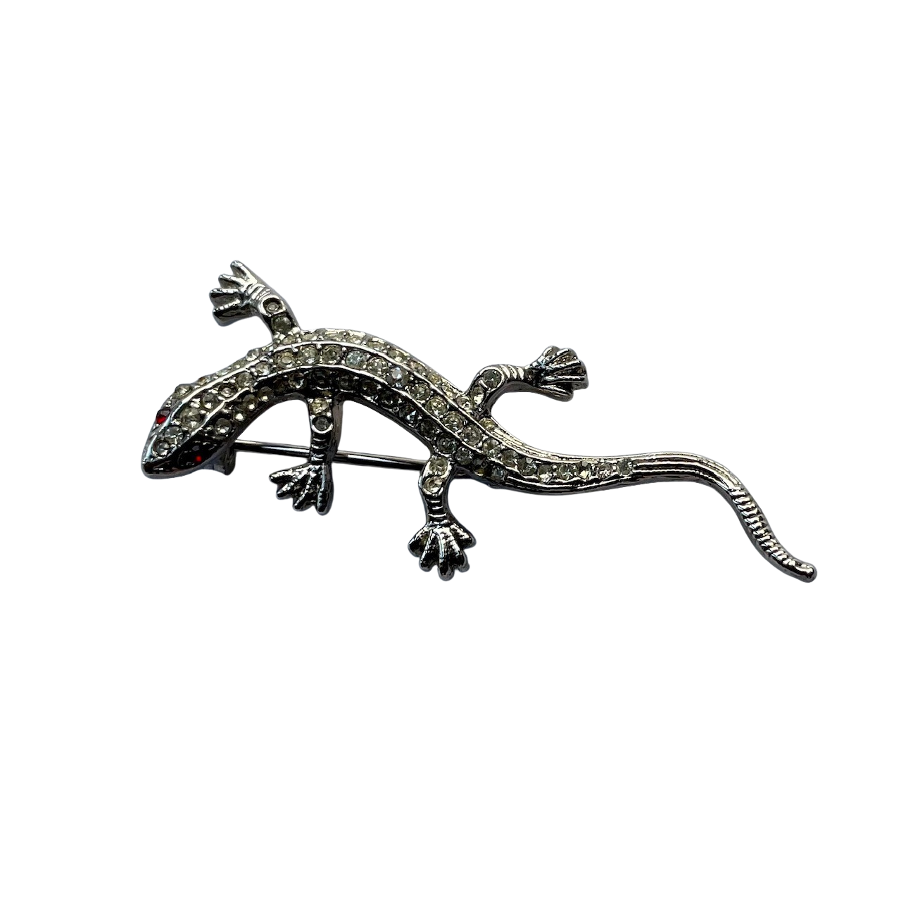 A vintage 1980s Butler & Wilson small lizard brooch entirely pavé set with clear crystals and red crystal eyes shown on white background