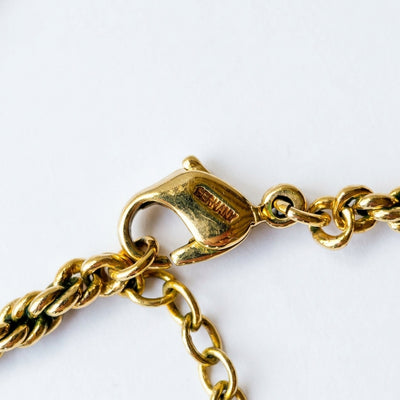 Close up of Christian Dior Ivy Leaf necklace showing Germany stamp on lobster clasp.