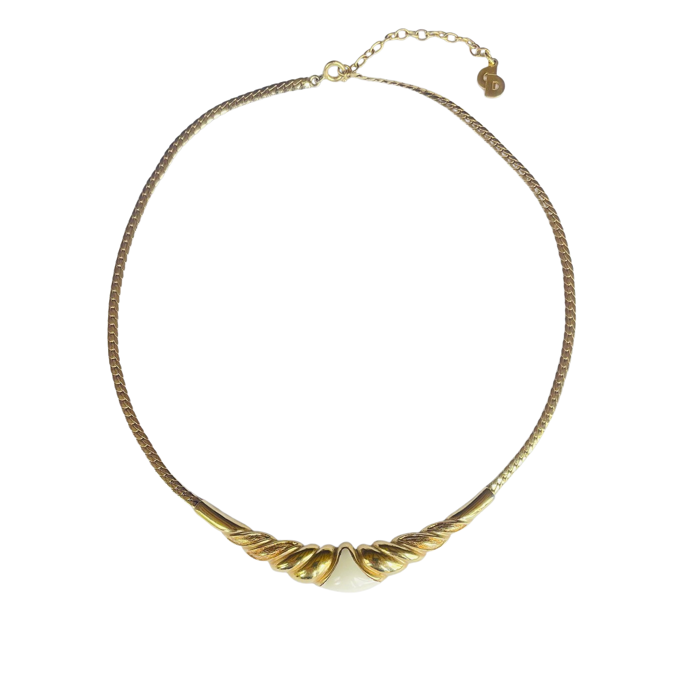 Vintage 1980s Christian Dior gold-plated collar necklace featuring a fluted centerpiece, cream enamel shield insert, and signed CD charm. Excellent condition.