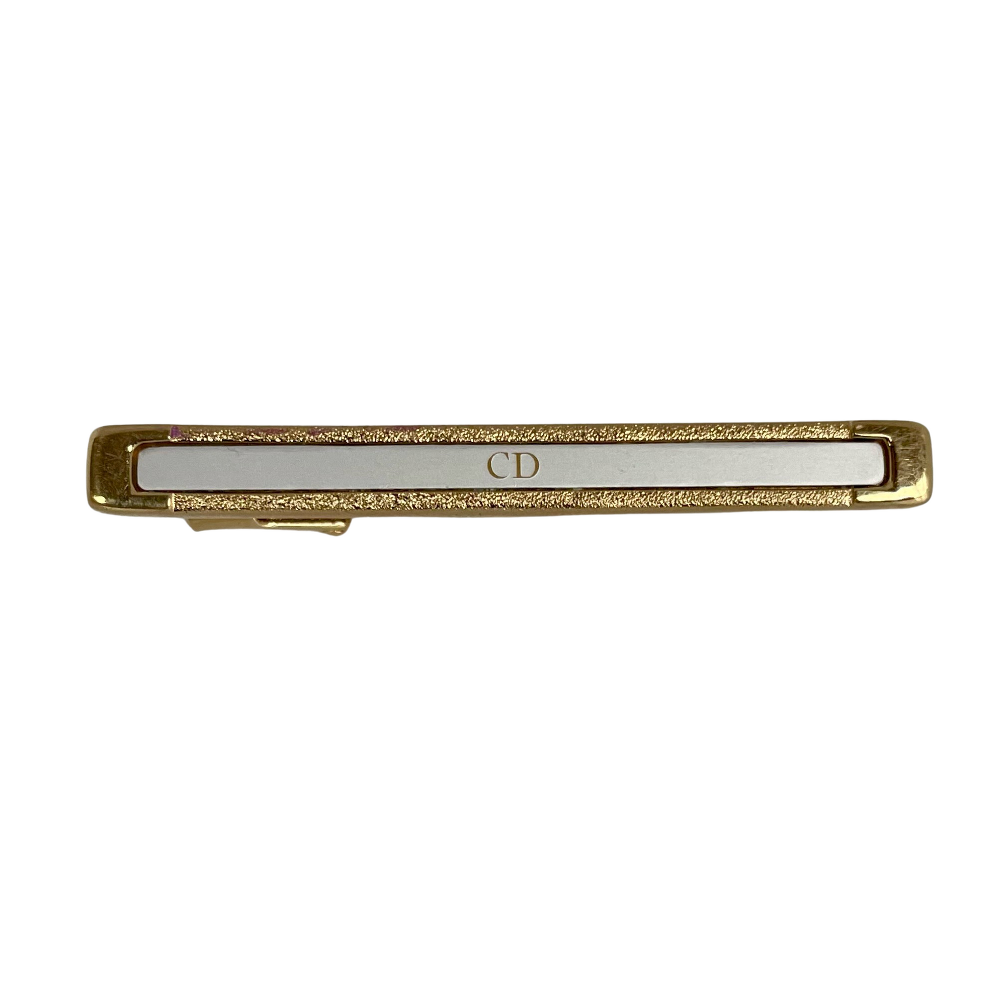 A Christian Dior Vintage Tin Pin