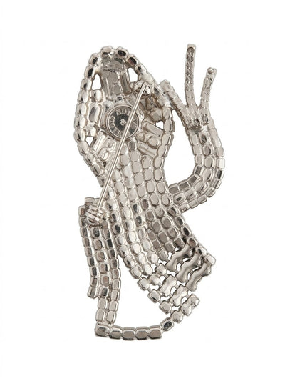 Close up of the reverse of magnificent 19 cm vintage Butler & Wilson silver-tone articulated lizard brooch showing the Butler & Wilson backstamp and top pin fastening.