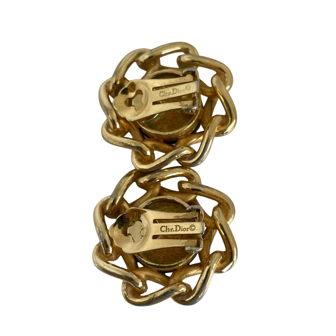 Reverse of Christian Dior earrings with polished gold-plated chain and black cabochons showing Chr. Dior © backstamp.
