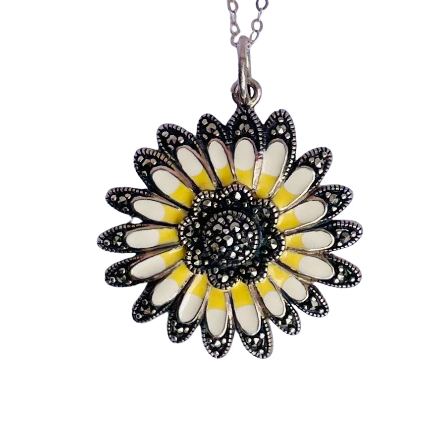 Vintage sterling silver daisy pendant necklace with marcasite border and yellow and cream enamel petals, on a new 18 inch sparkly silver chain.