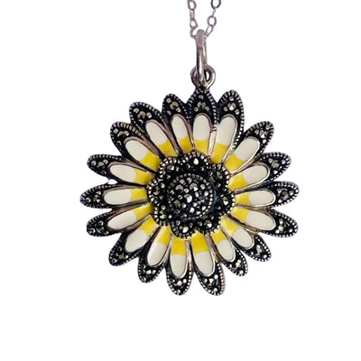 Vintage sterling silver daisy pendant necklace with marcasite border and yellow and cream enamel petals, on a new 18 inch sparkly silver chain.