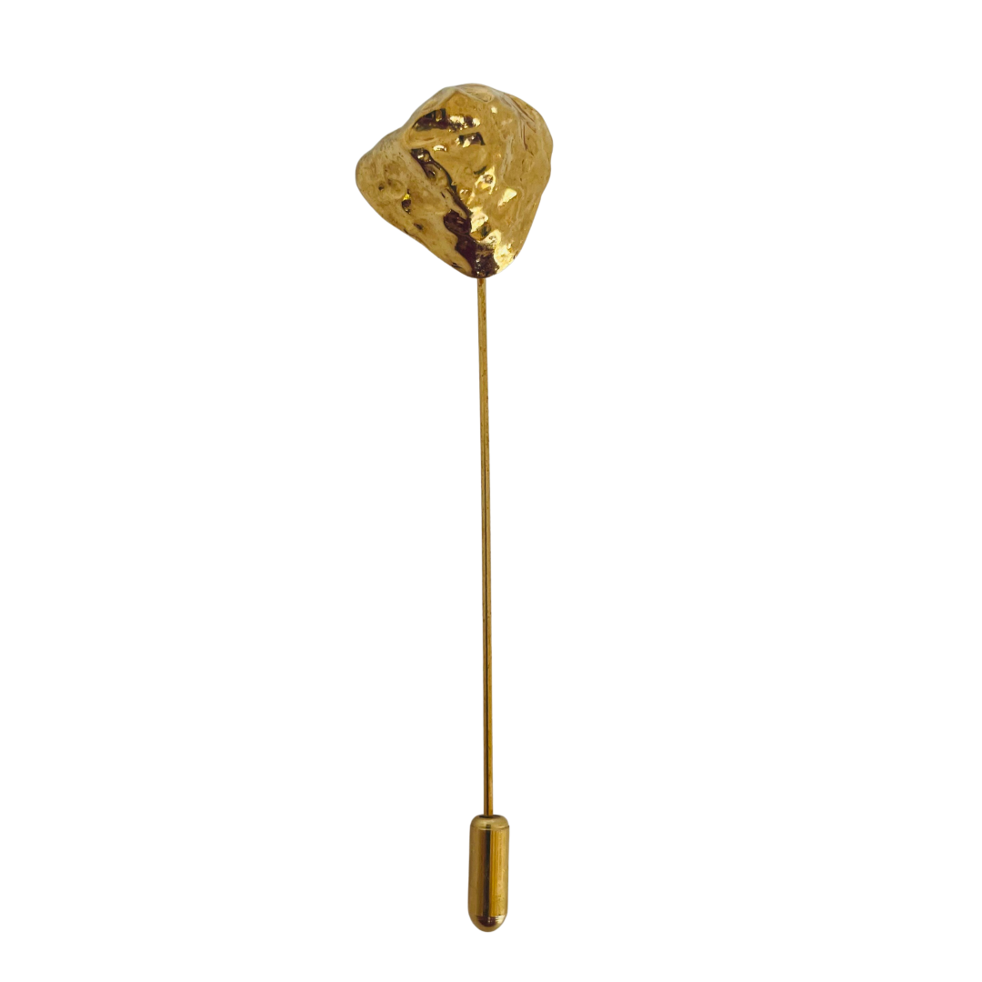 A Vintage Yves Saint Laurent Golden Nugget Stick Pin
