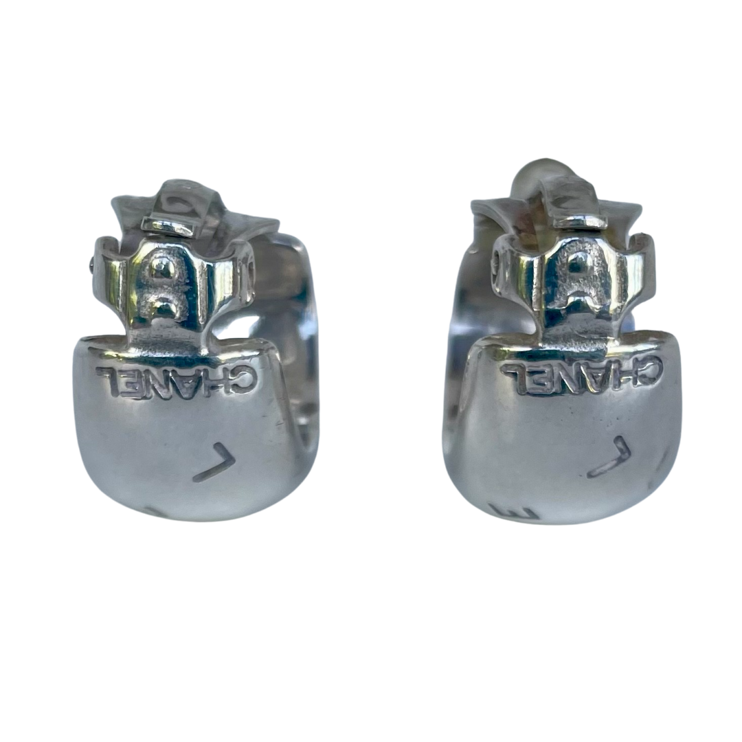 A pair of Vintage Chanel Silver Letters Earrings