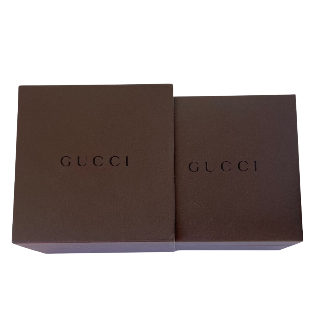 Gucci box and outer sleeve for Vintage Gucci men's sterling silver gate-link ID plate bracelet with signature Gucci engraved plate, white background