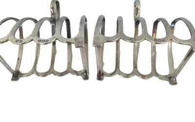 A pair of Art Deco Sterling Silver Toast Racks dated 1926