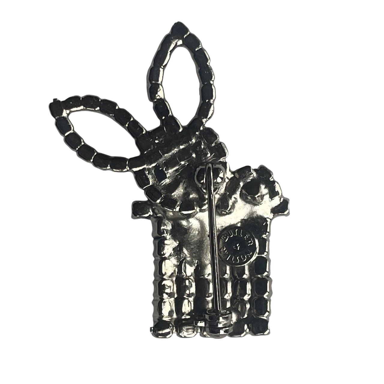 reverse side of Butler & Wilson rabbit in top hot brooch showing pin mechanism and Butler & Wilson mark in circular cartouche.