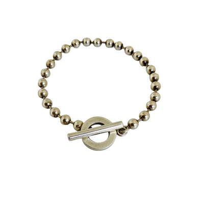 Vintage Gucci silver ball chain bracelet featuring iconic engraved circular toggle clasp