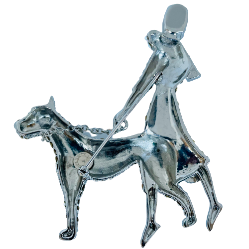 A Butler & Wilson Large Crystal Lady and Dog Brooch