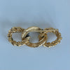 A Vintage Christian Dior Triple Loop Gold-Plated Crystal Brooch