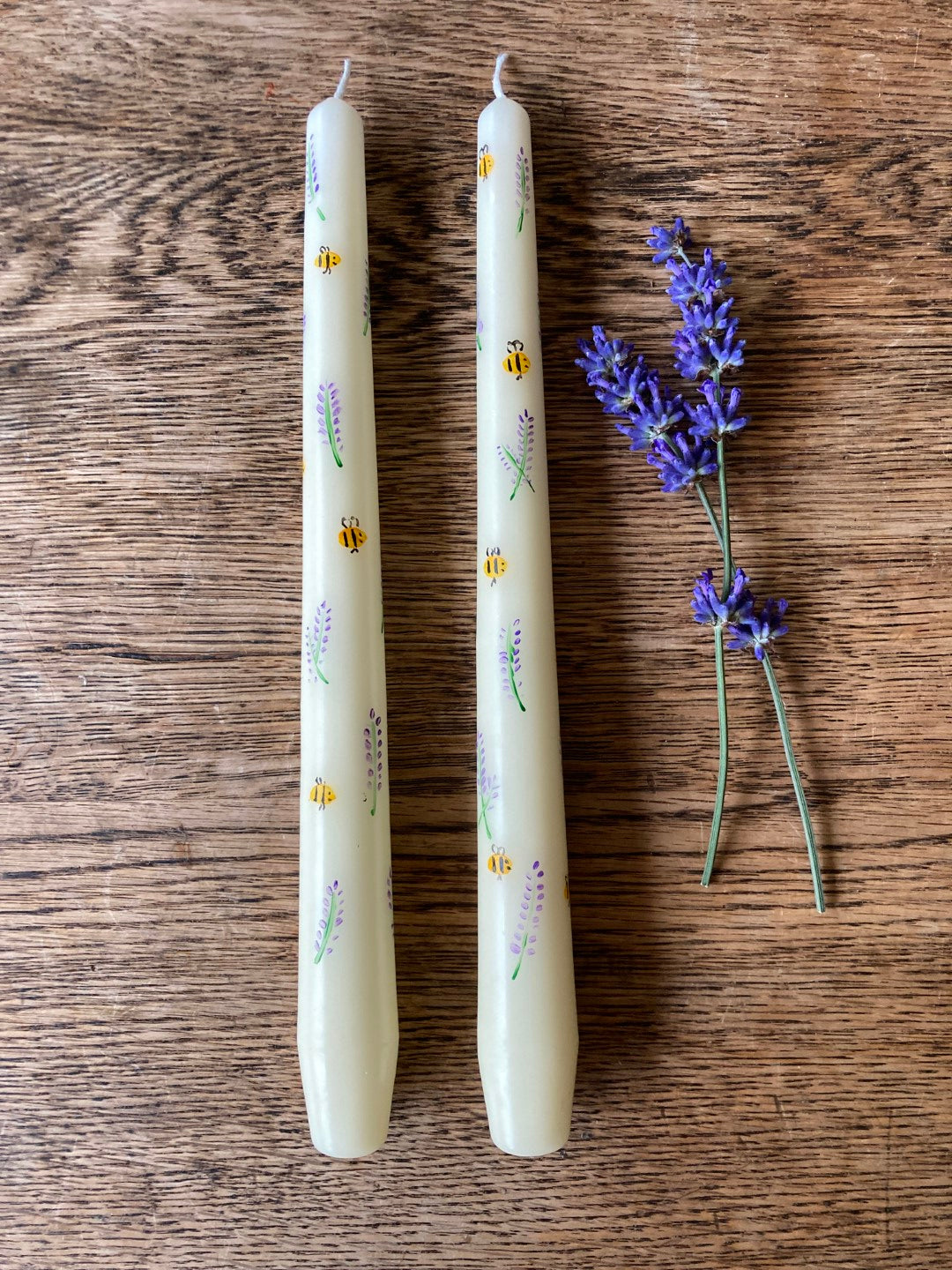 A Pair of Hand-Painted Lavender and Bee Candles