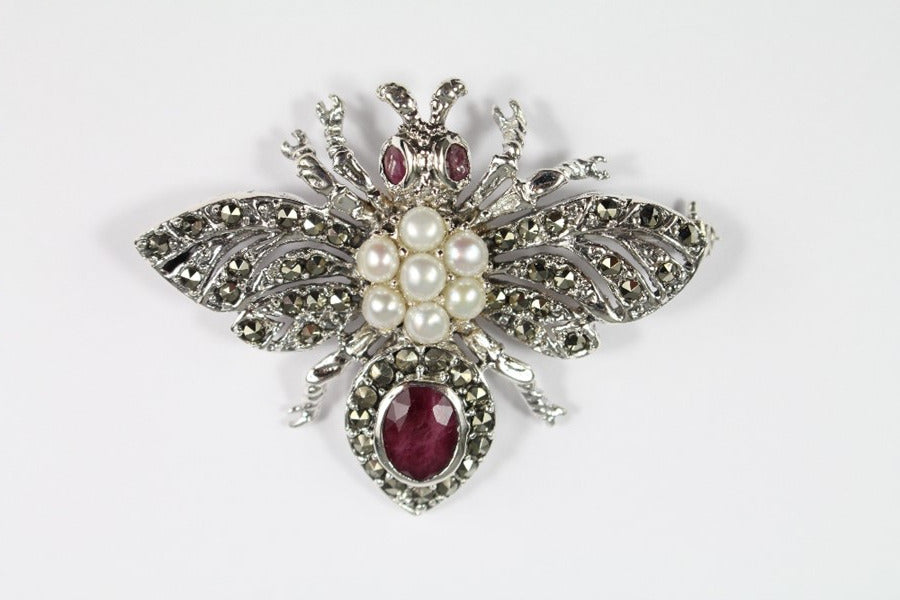 A Vintage Ruby and Pearl Silver Bug Brooch