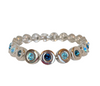 A Vintage Bracelet set with Aqua and Blue Sapphire coloured Stones