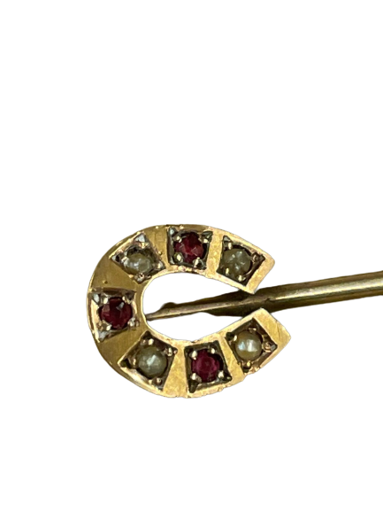 A Late 19th Century Horseshoe Stickpin, Ruby and Seed Pearl