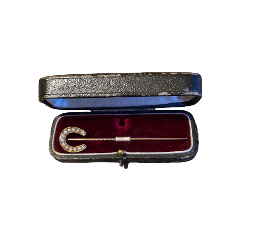 A late 19th Century Gold and Pearl Horseshoe Pin