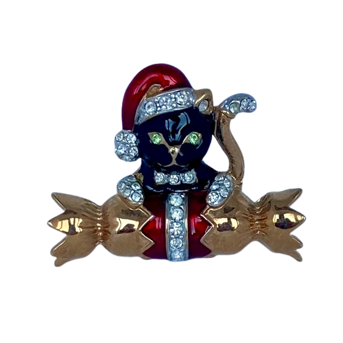 A Butler & Wilson Black Cat on Cracker Brooch