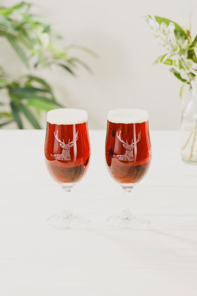 A Pair of Stag Engraved Craft Beer Glasses