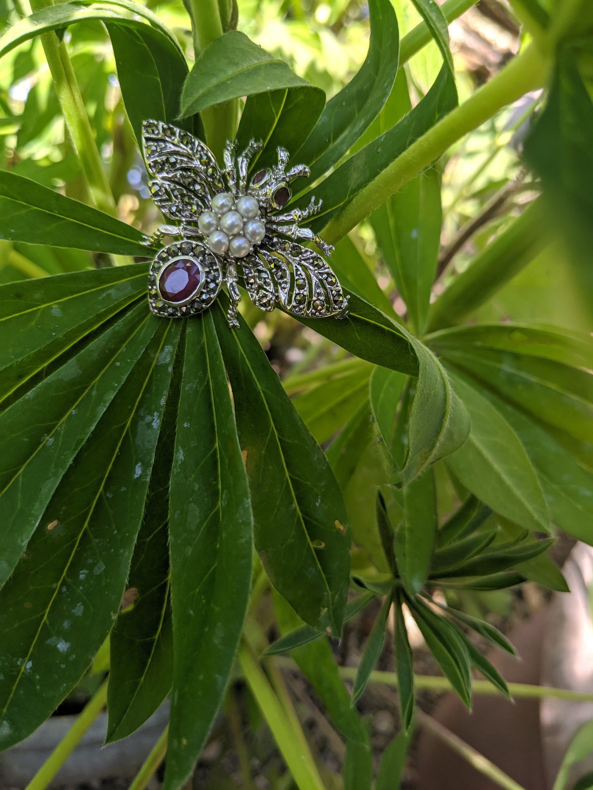 A Vintage Ruby and Pearl Silver Bug Brooch