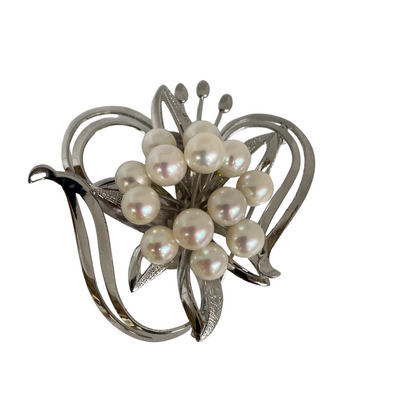 A Vintage Silver and Pearl Flower Brooch, in the style of Mikimoto