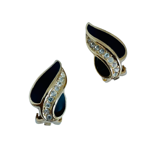 A pair of vintage gold plated Christian Dior crystal and enamel leaf clip-on earrings with black enamel accents.