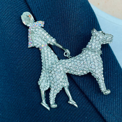A Butler & Wilson Large Crystal Lady and Dog Brooch