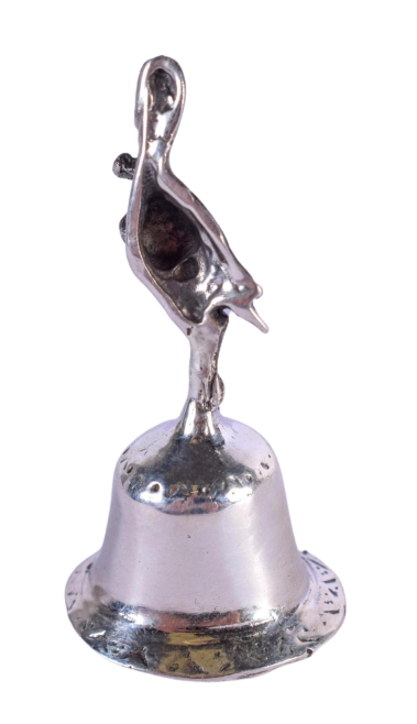 A Vintage Silver Bell with Stork delivering a Baby